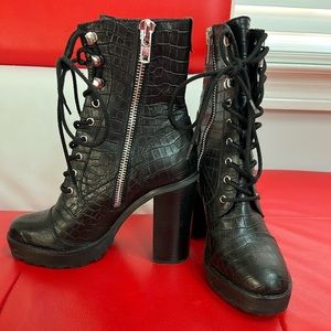 Black leather high heels boots